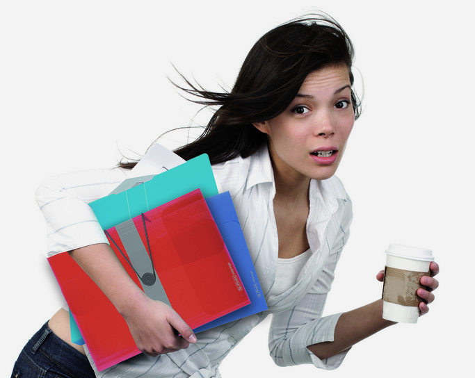 A woman with paperwork and coffee tripping