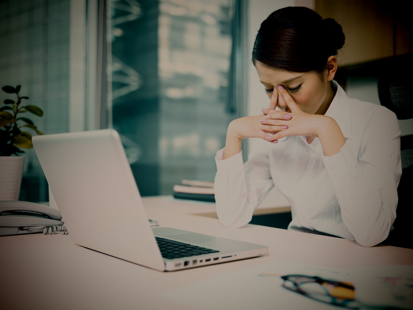 stressed asian businesswoman