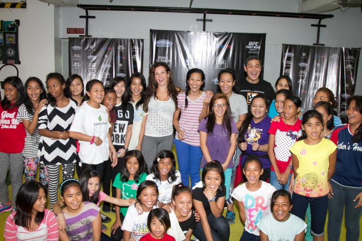 Miesha Tate with her self-defense class students during her trip to Manila