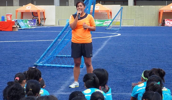 Marielle tells preteen girls about her experiences as an athlete at the first Girls Got Game sports camp. Photo by the author.