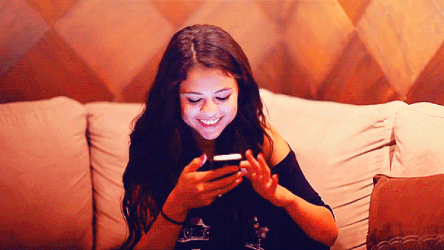 Selena Gomez on her Phone