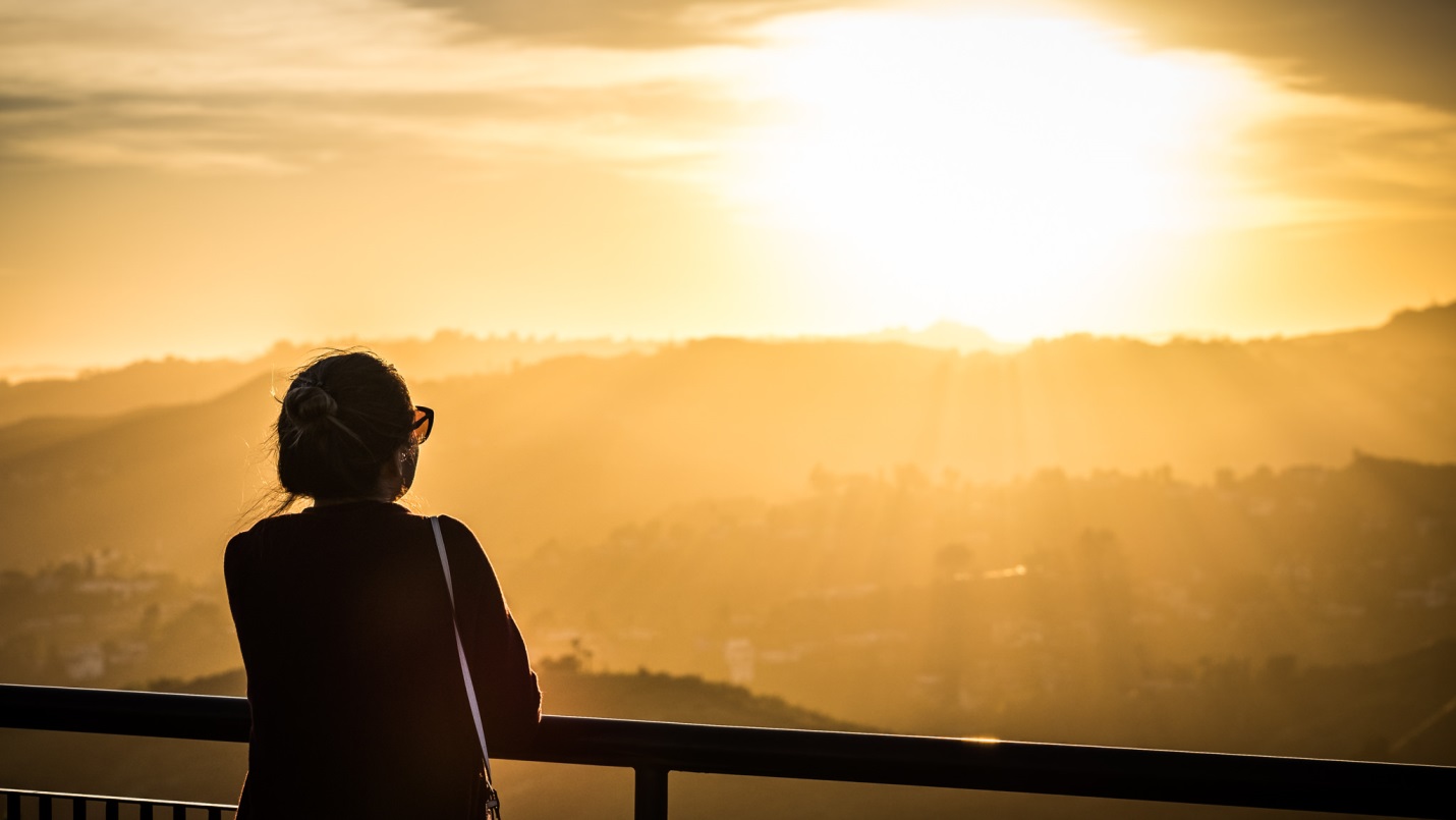 Woman Watching the Sunset