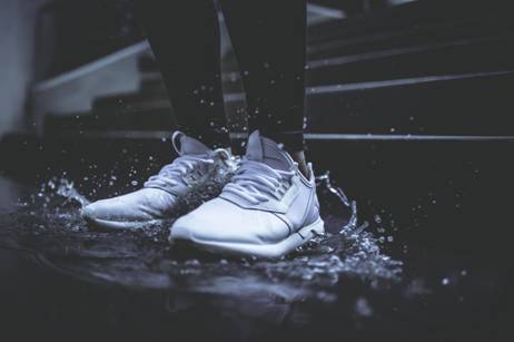 Shoes on a Rain Puddle