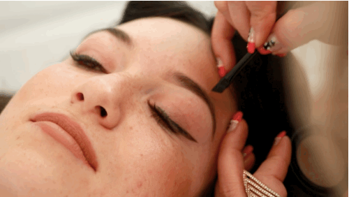 Woman Having her Brows Microbladed