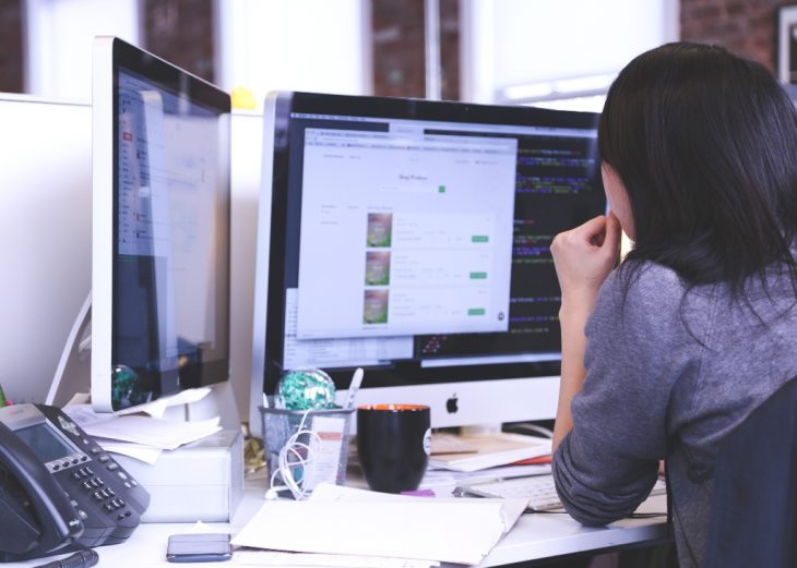 Woman Working In PC