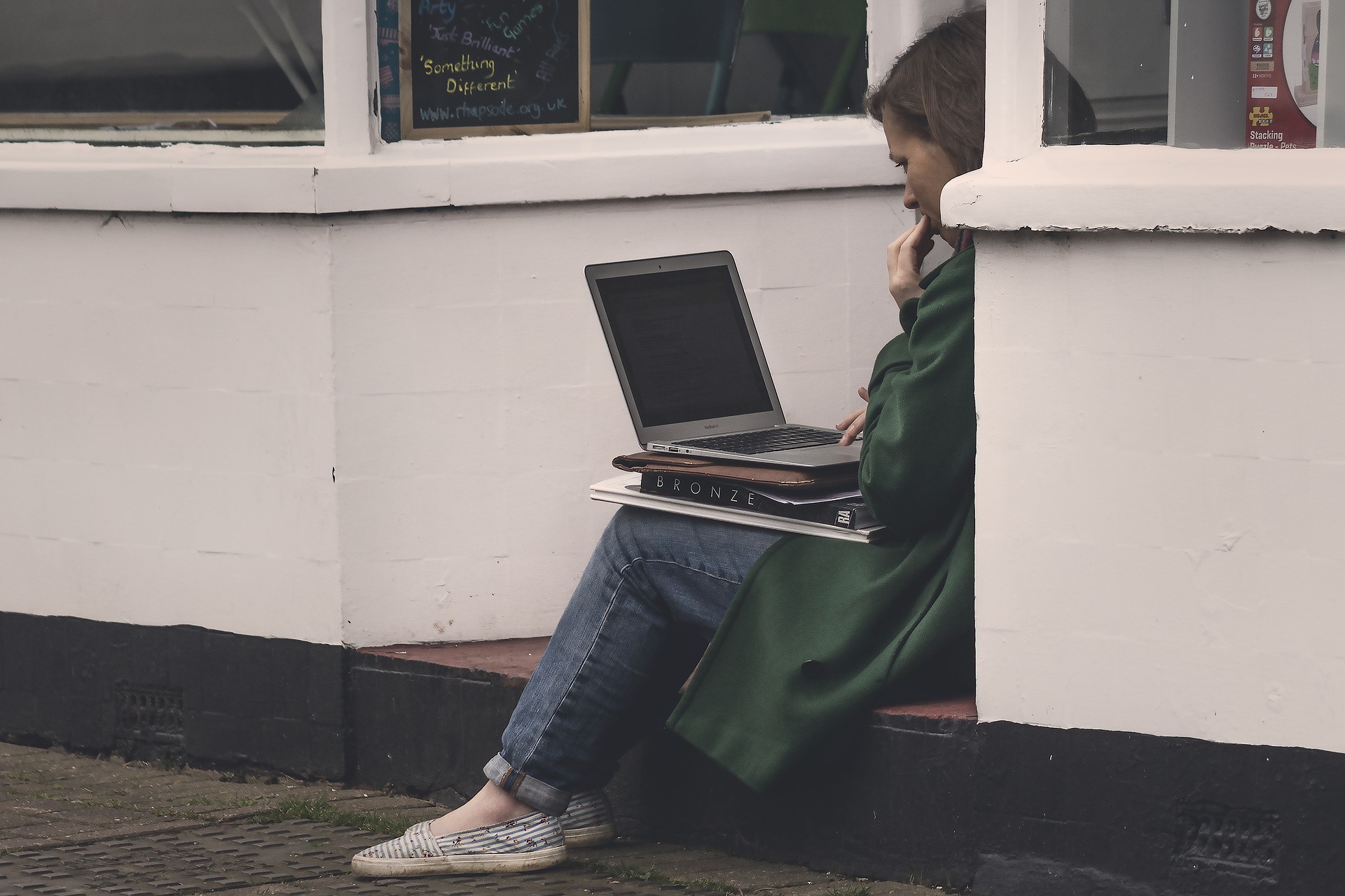 Woman Working On Her Laptop