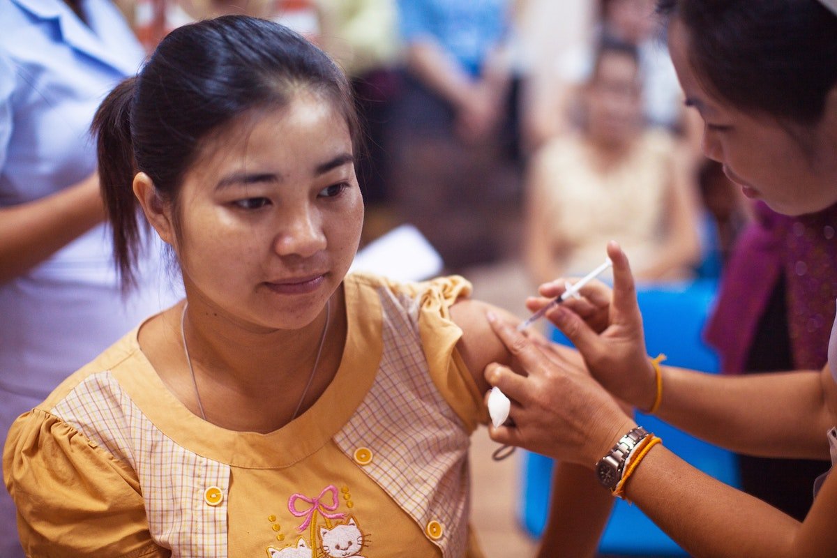 woman getting vaccinated