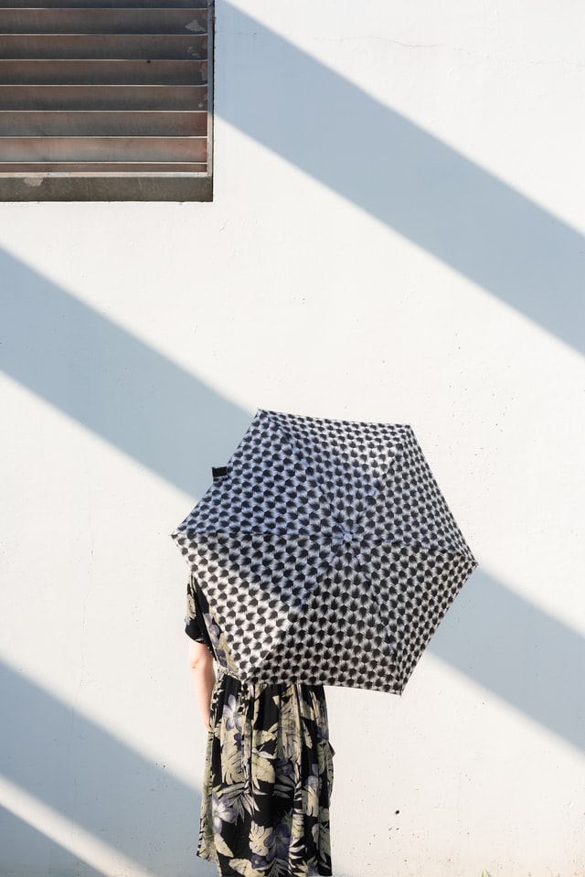 person holding umbrella