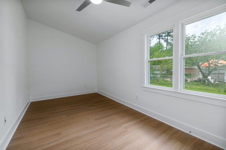 A Room with White Walls and Glass Windows
