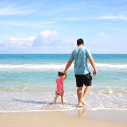 father and daughter at the beach