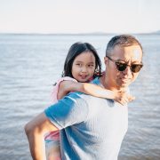 Father Carrying his Daughter on his Back