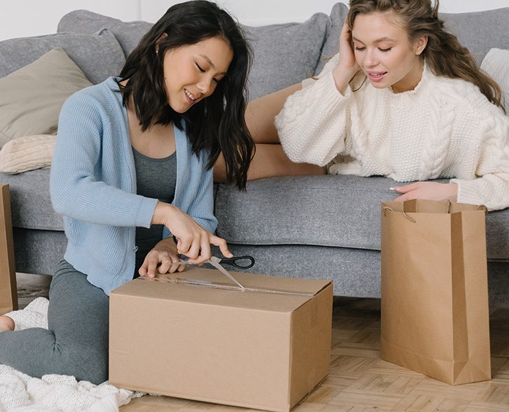 woman opening packages