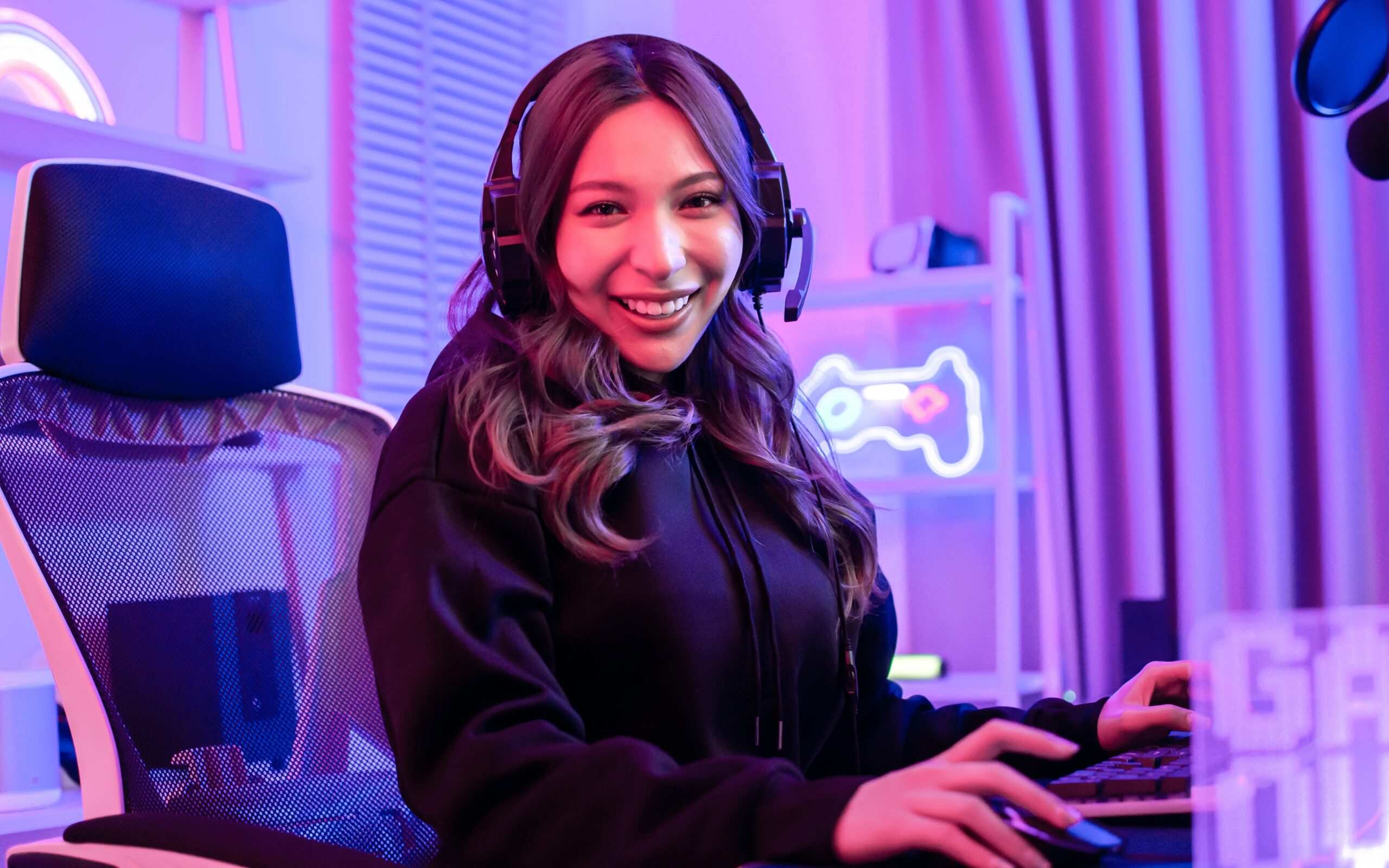 a woman gamer smiling