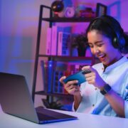 a young woman playing on her phone