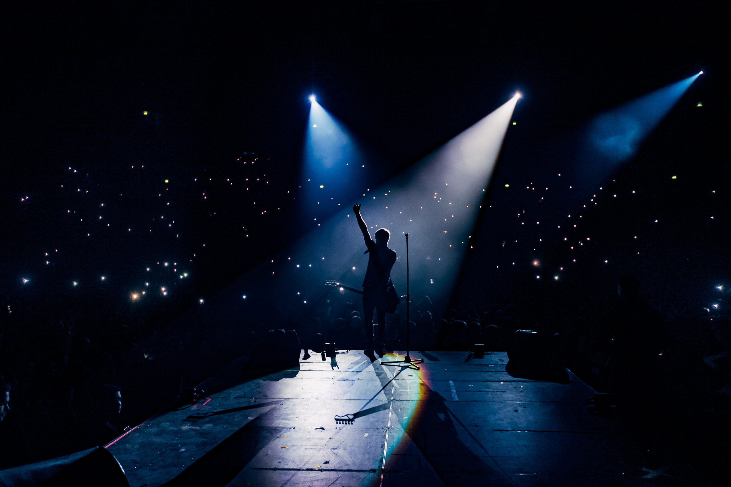 an artist singing on the stage