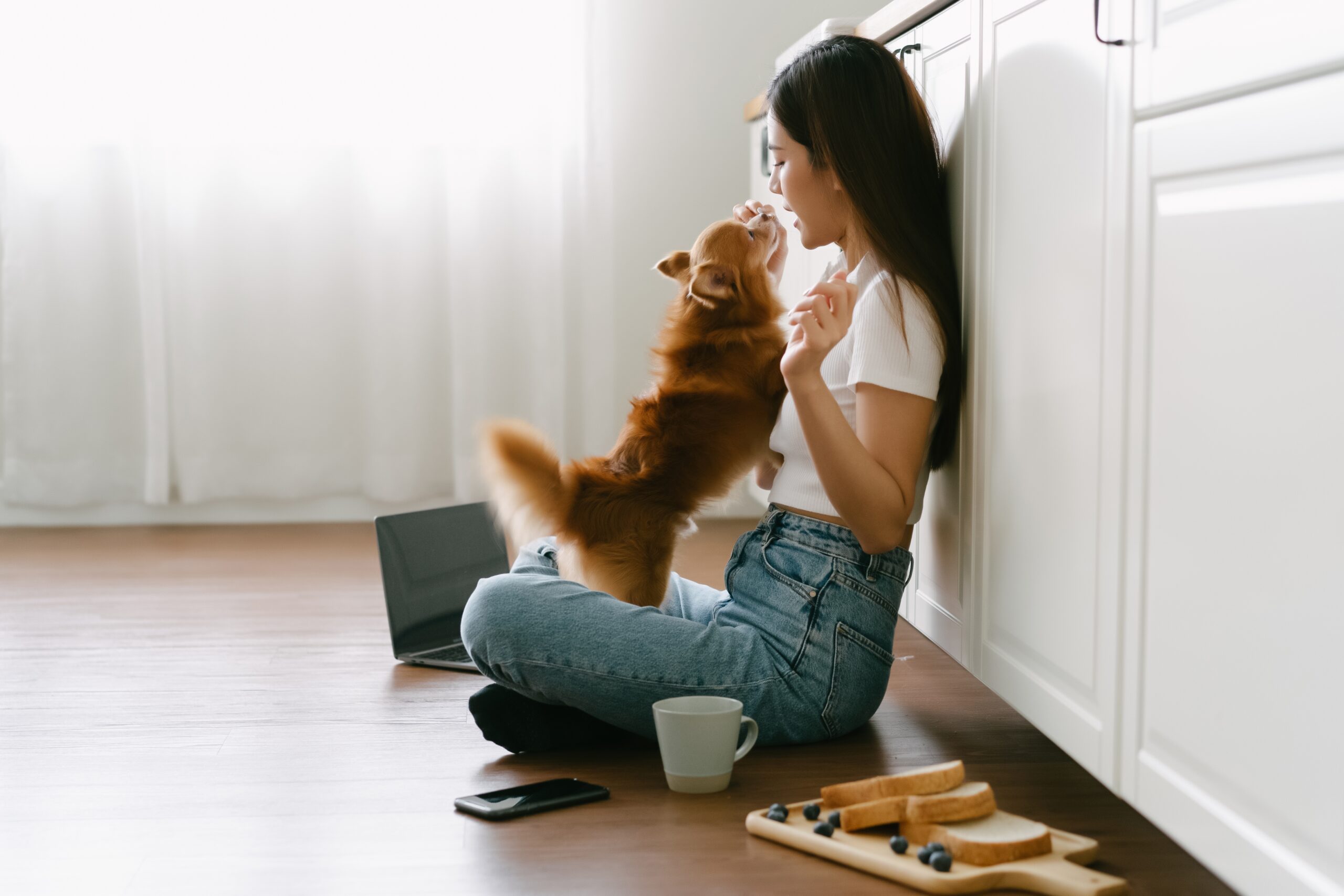 a lady and her dog bonding