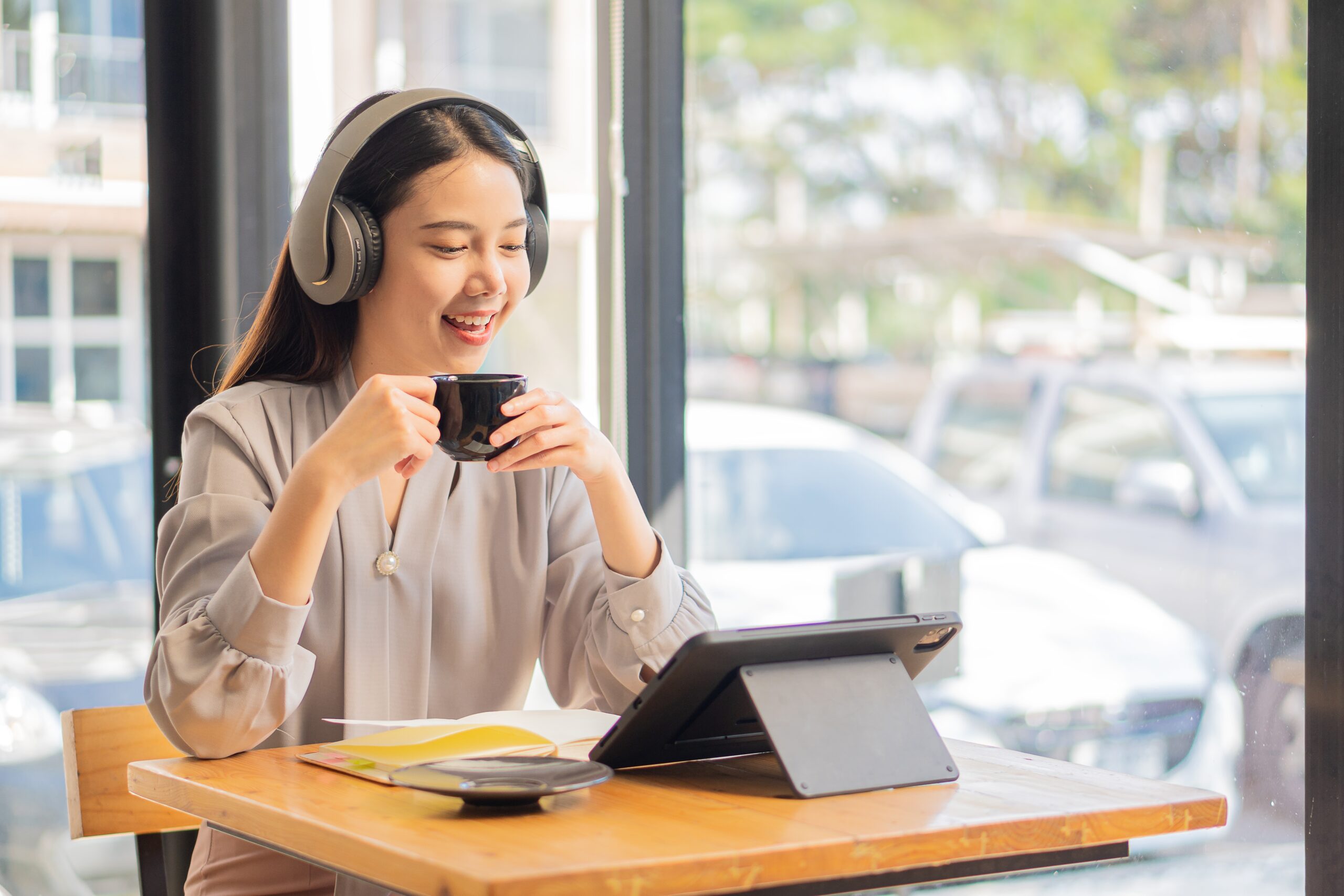 a woman watching a recorded podcast