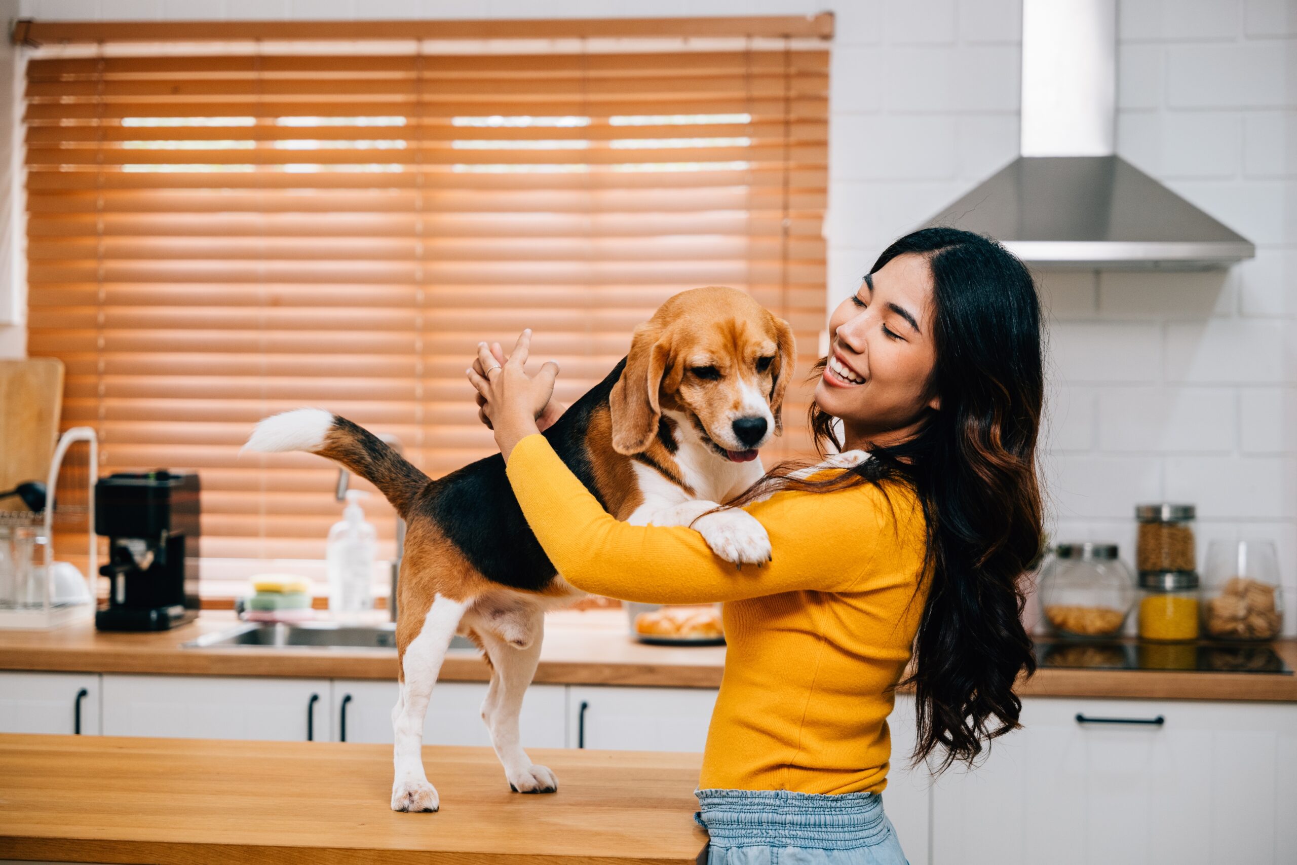a lady and her dog bonding