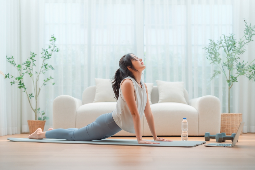 a woman doing cobra stretch
