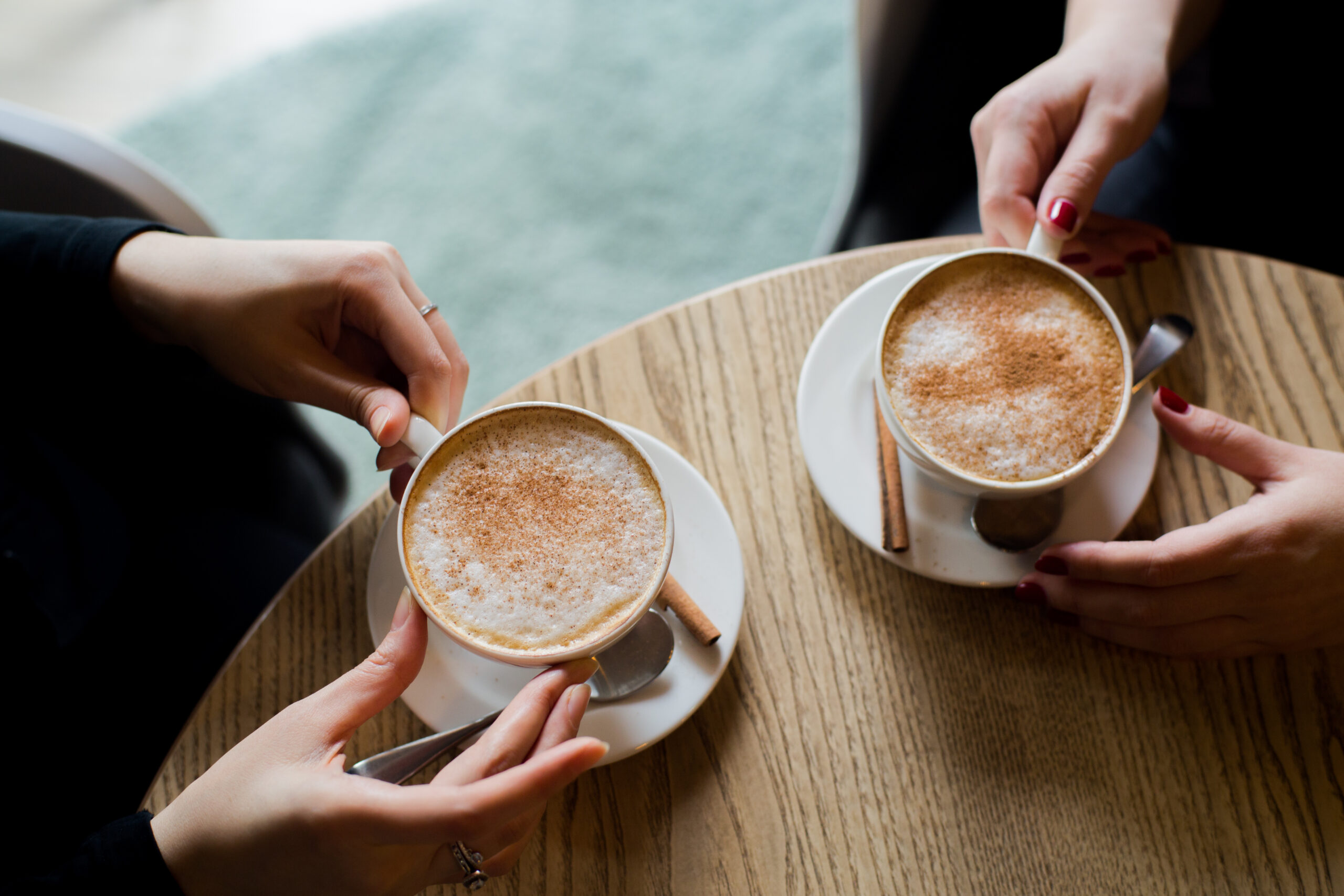 two ceramic mugs with coffee