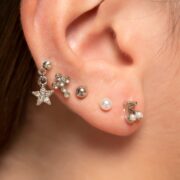 different ear piercing designs on an ear