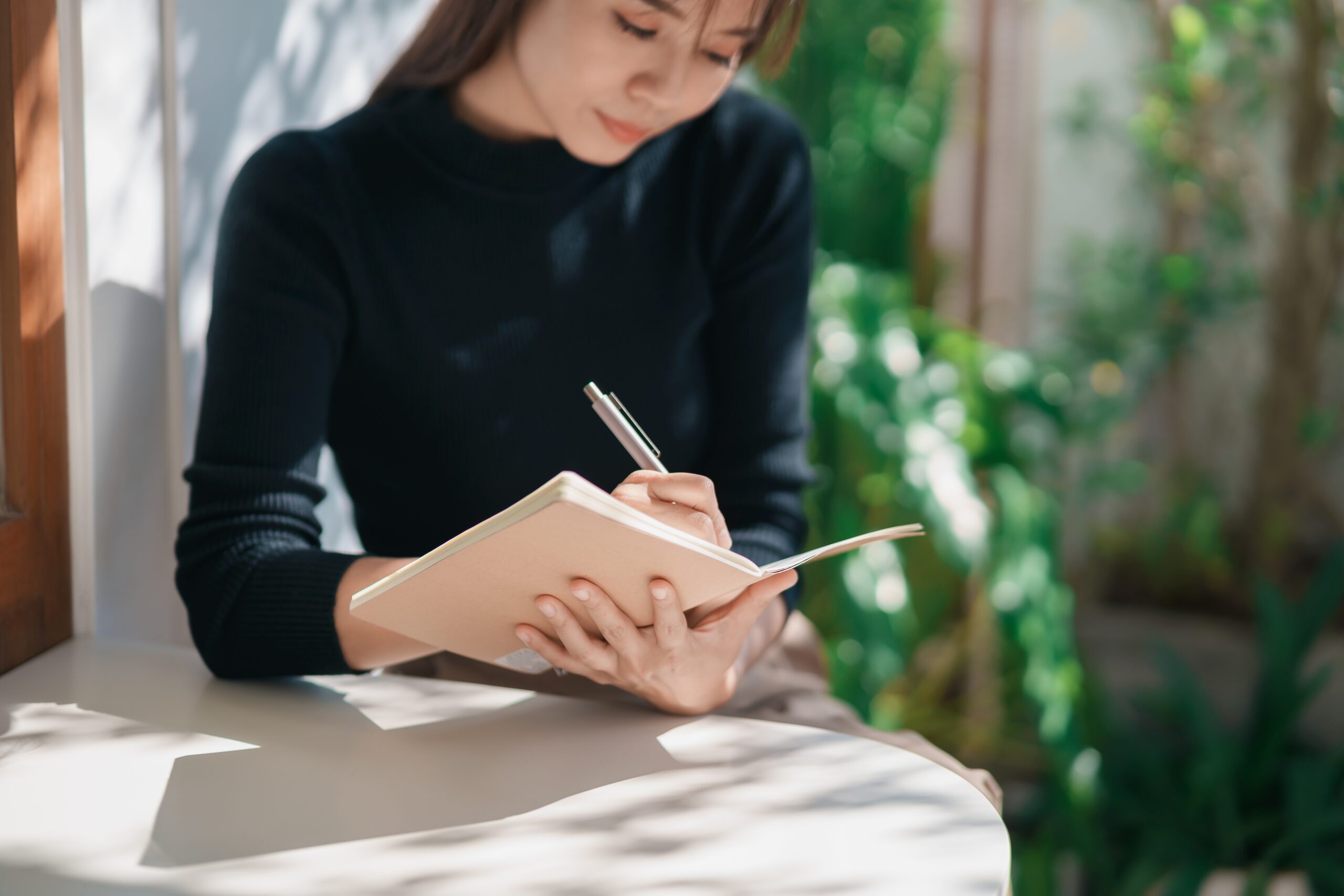 a woman writing poetry