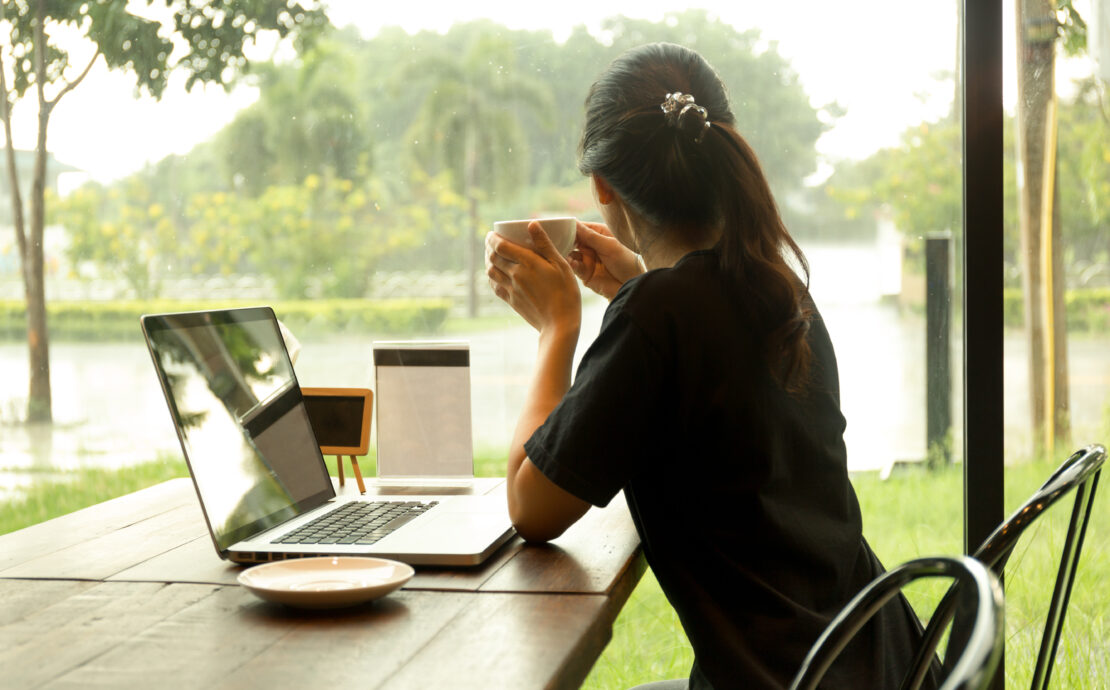 a woman watching the rain