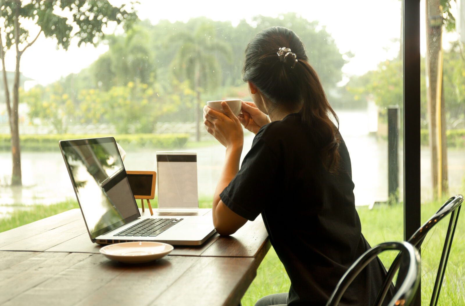 a woman watching the rain